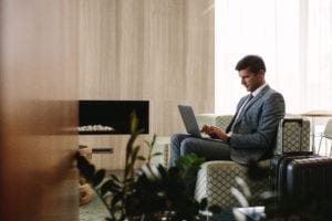 Business man getting work done in hotel